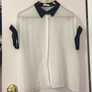 White button down shirt with black accents
